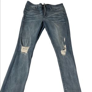 Blue denim distressed jeans